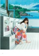 A woman sitting on the edge of a bathtub in a bathroom.